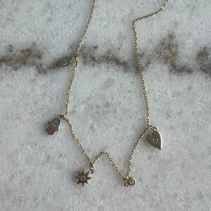Gold chain charm necklace